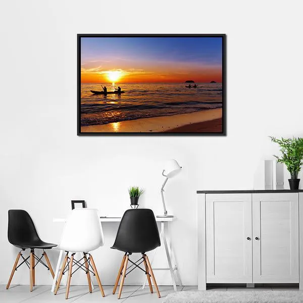 Kayakers At Sunset Canvas Wall Art