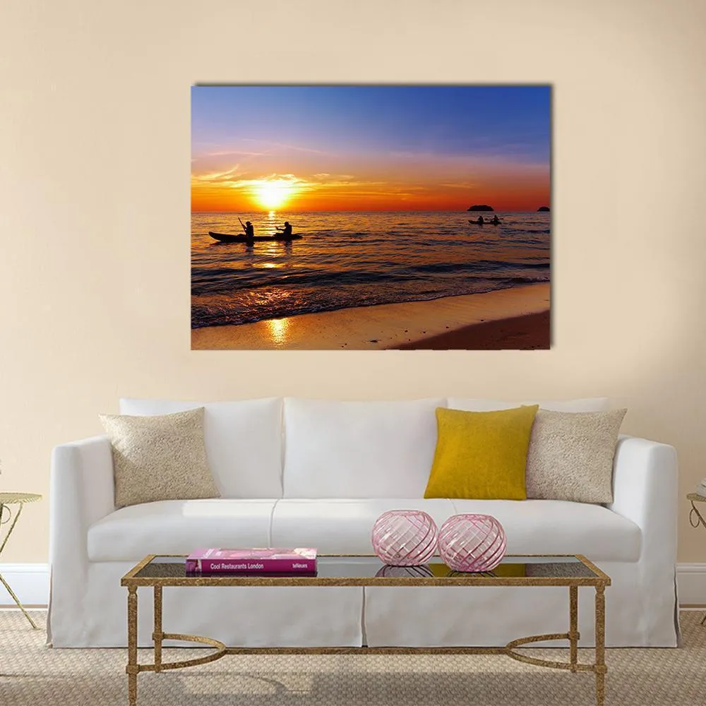 Kayakers At Sunset Canvas Wall Art