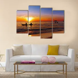 Kayakers At Sunset Canvas Wall Art